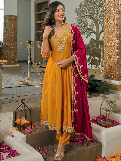 Mustard Yellow Embroidered Anarkali Suit with Pink Dupatta