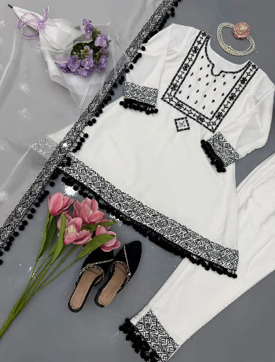 White Embroidered Mirror Work Peplum Style Suit Set